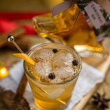 Christmas Gin Liqueur with edible gold sparkle